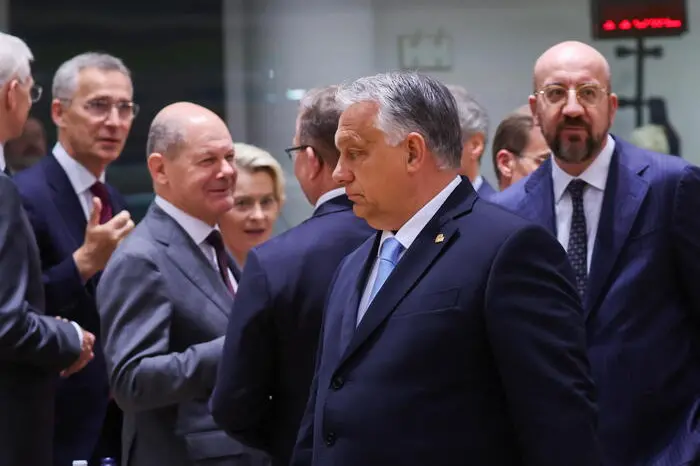 epa10717281 Hungarian Prime Minister Viktor Orban is passing in front of Nato Secretary General Jens Stoltenberg , German Federal Chancellor Olaf Scholz, European Council President Charles Michel during a European Council in Brussels, Belgium, 29 June 2023. EU leaders are gathering in Brussels for a two-day summit to discuss the latest developments in relation to Russia's invasion of Ukraine and continued EU support for Ukraine as well as the block's economy, security, migration and external relations, among other topics. EPA/OLIVIER HOSLET