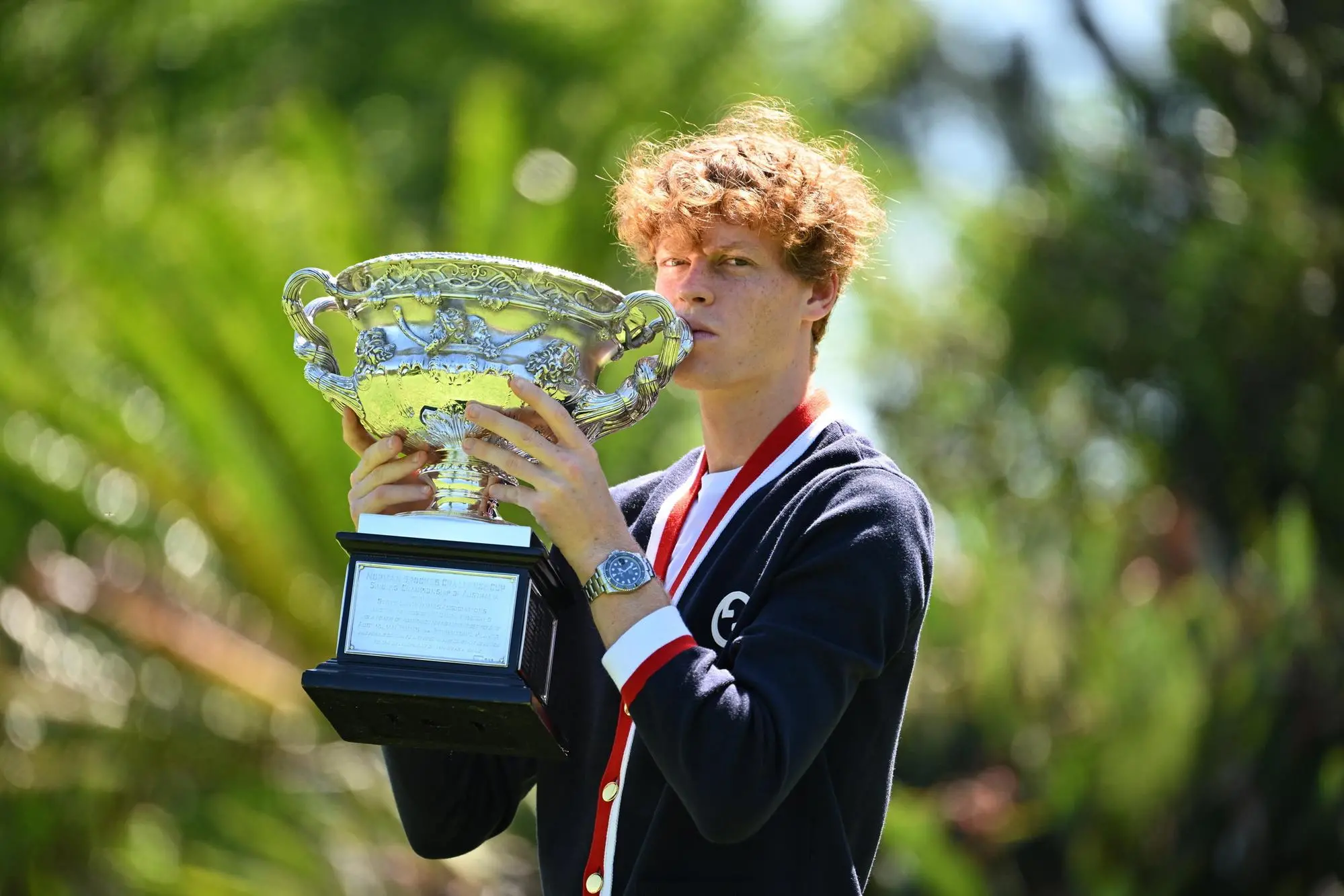 epa11111783 Jannik Sinner of Italy poses for a photograph with the Norman Brookes Challenge Cup following his win over Daniil Medvedev of Russia in the Men’s Singles Final at the 2024 Australian Open tennis tournament in Melbourne, Australia, 29 January 2024. EPA/JAMES ROSS AUSTRALIA AND NEW ZEALAND OUT