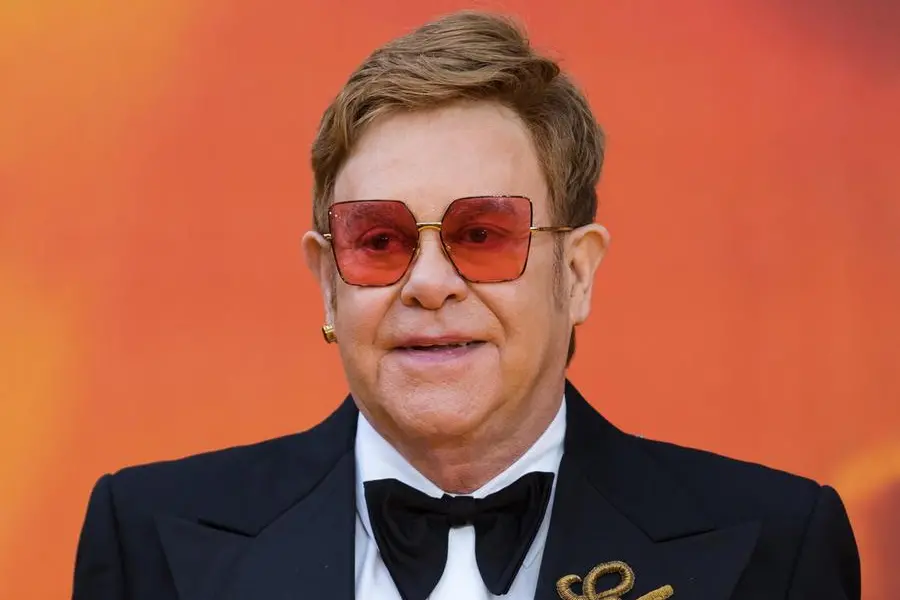 epa09842571 (FILE) - British musician Sir Elton John poses on the red carpet at the European premiere of 'The Lion King' in Leicester Square in London, Britain, 14 July 2019 (reissued 22 March 2022). Elton John turns 75 on 25 March 2022. EPA/VICKIE FLORES *** Local Caption *** 55731260