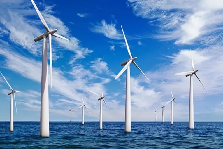 Un parco eolico come quello che si vorrebbe far sorgere di fronte alle coste del Sulcis (L'Unione Sarda)