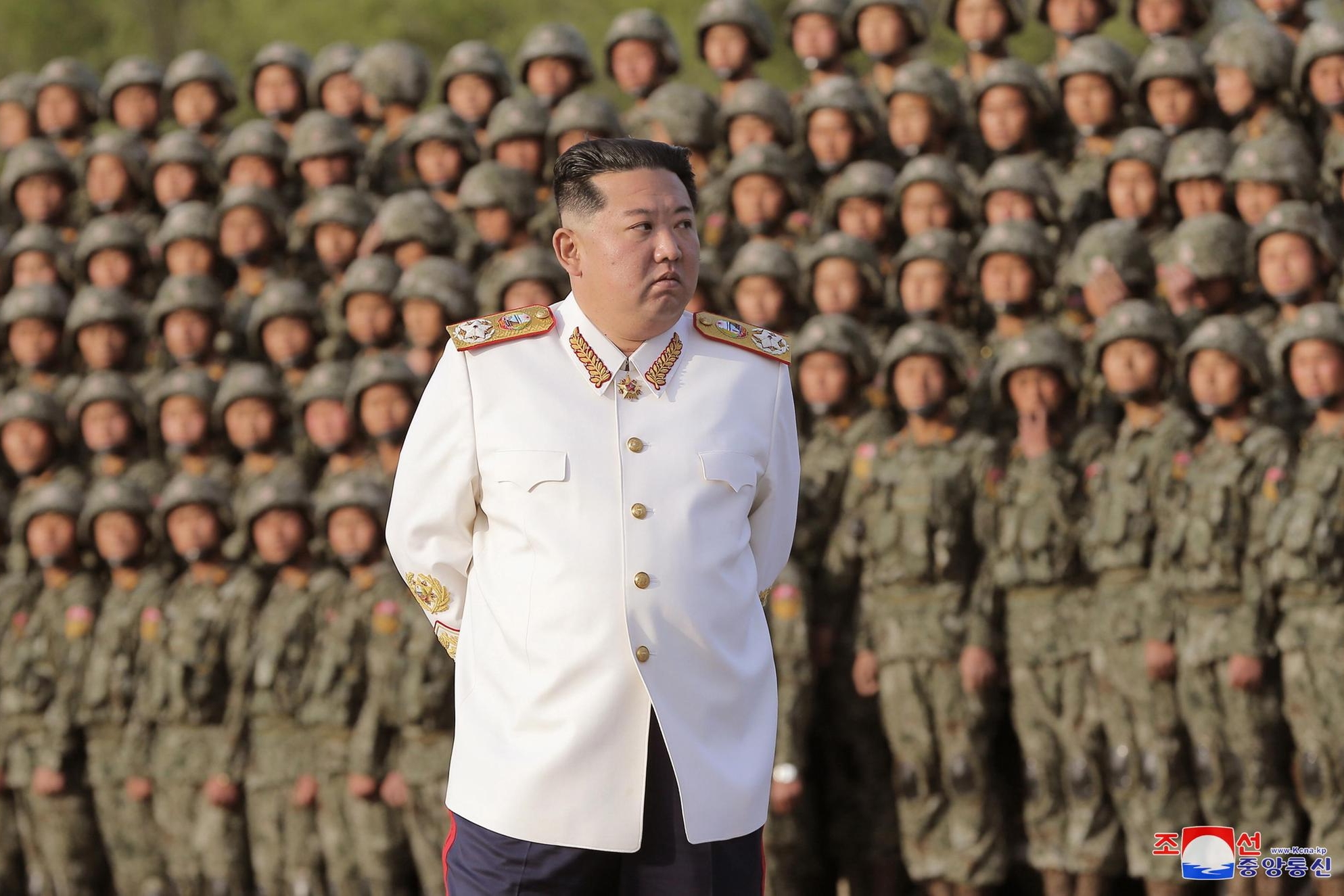 epa09915666 A photo released by the official North Korean Central News Agency (KCNA) shows North Korean Supreme Leader Kim Jong-Un wearing a white marshal uniform, during a photo session with the officers and soldiers that took part in a military parade, in Pyongyang, North Korea, 27 April 2022 (issued 29 April 2022). The soldiers participated in a military parade in Pyongyang on April 25 to mark the 90th anniversary of the Korean People's Revolutionary Army. EPA/KCNA EDITORIAL USE ONLY
