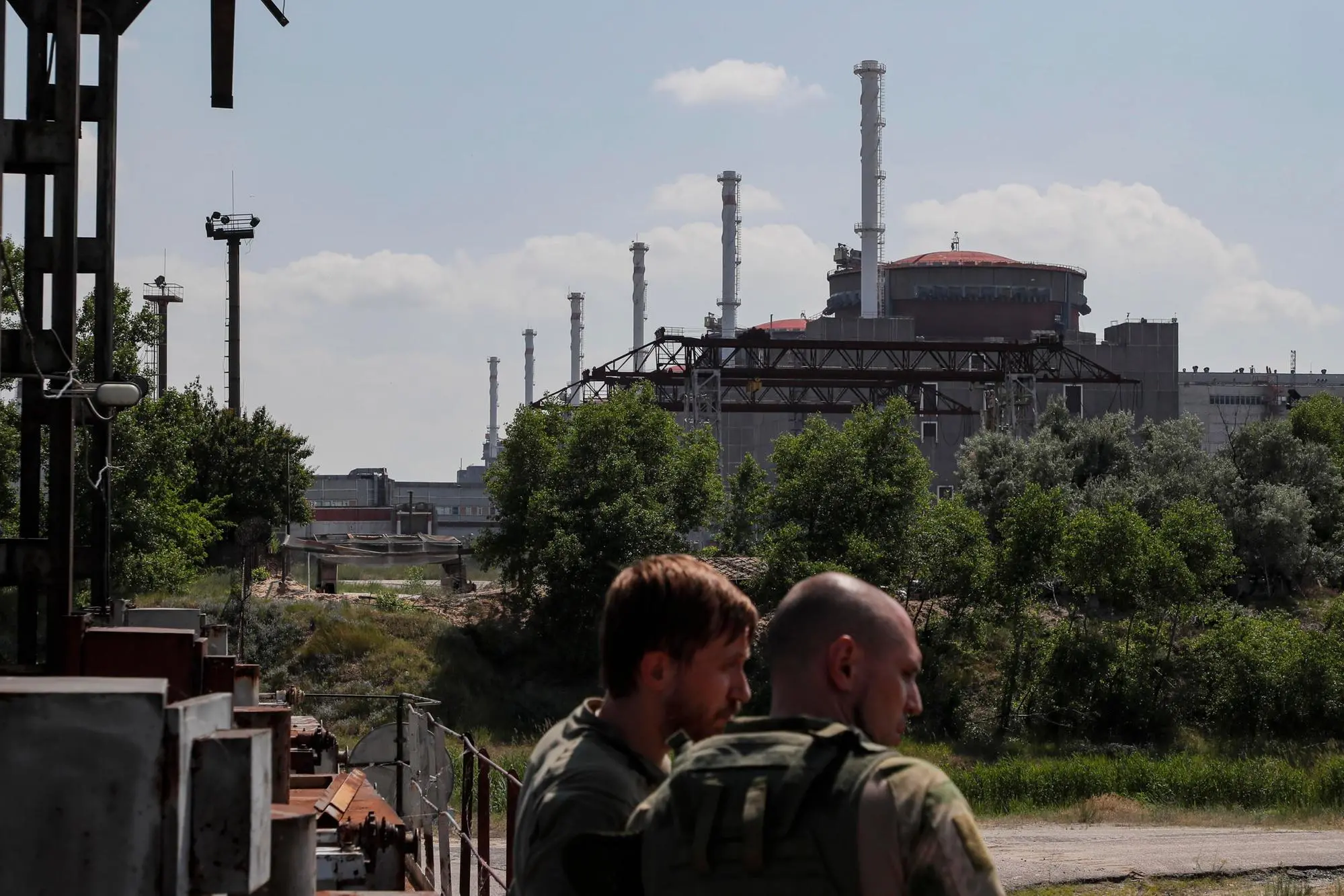 epa10693169 A picture taken during a visit to Enerhodar organised by the Russian Defence ministry shows a general view of the Zaporizhzhia Nuclear Power Plant in Enerhodar, southeastern Ukraine, 15 June 2023. The Zaporizhzhia Nuclear Power Plant can still continue to draw water from the Kakhovka reservoir, the IAEA reports. Grossi said that after the destruction of the Kakhovka hydroelectric power station, a situation may arise when the water from the Kakhovka reservoir will not be enough to cool the reactors of the Zaporozhye nuclear power plant. According to him, in this case, the reactors can be damaged, which threatens with the onset of radiological consequences. The water level in the reservoir near the Zaporizhzhya TPP has dropped to 11.27 meters and continues to decline. EPA/SERGEI ILNITSKY