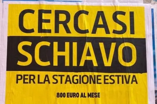 Uno dei manifesti (Ansa)