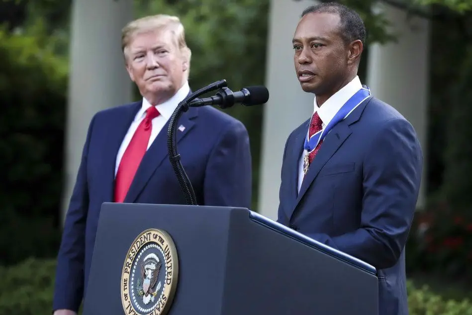 Donald Trump e Tiger Woods (Ansa)