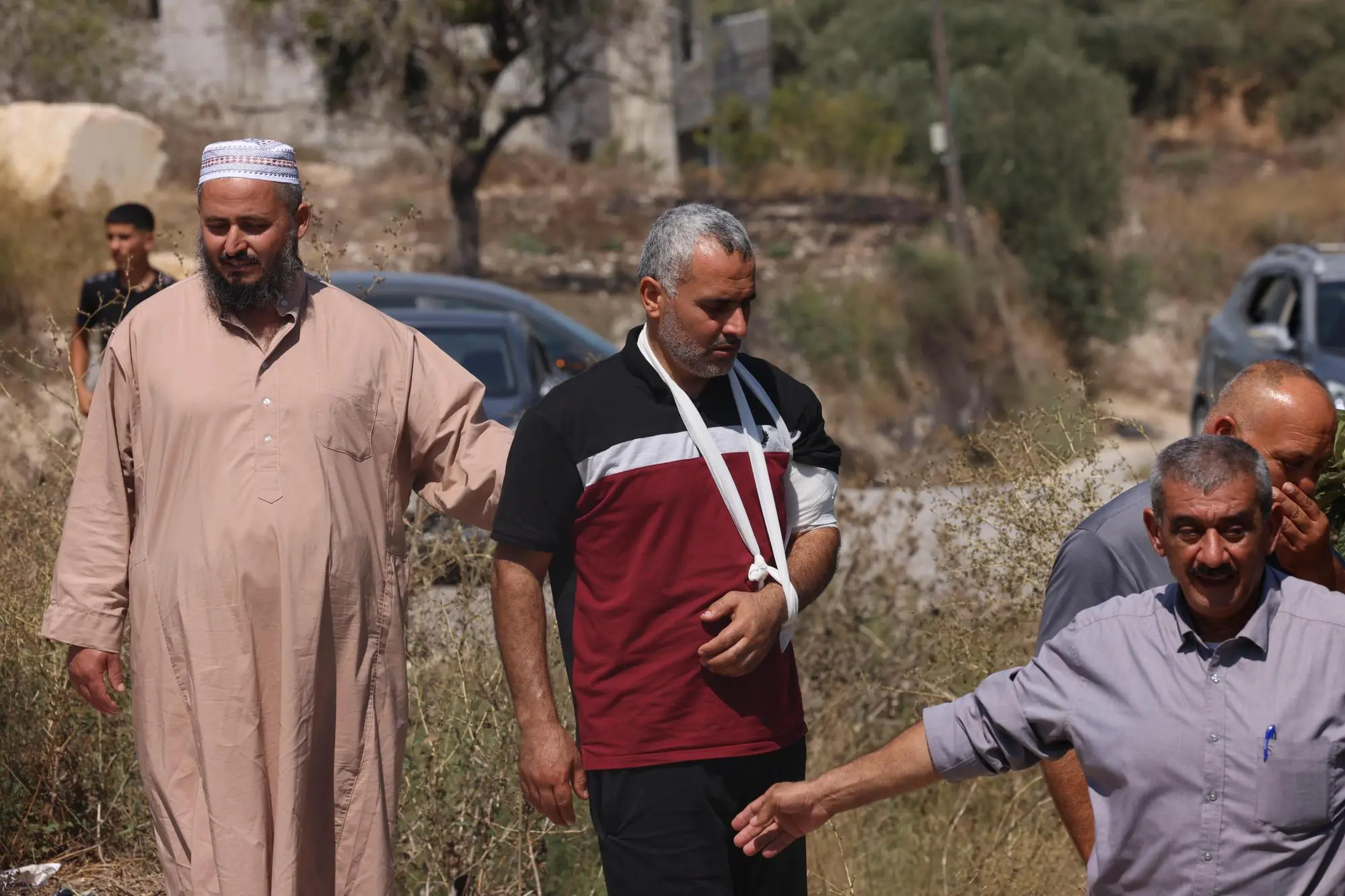 epa13219933 Relatives of Palestinian youth Omar Mohammad Toubasi, who was killed by Israeli settlers, mourn during his funeral in the village of Hajja, east of Qalqilya in the West Bank, on 07 September 2026. According to the Ministry of Health, 20-year-old Omar Mohammad Toubasi succumbed to a gunshot wound to the head sustained during the attack on 06 September. EPA/ALAA BADARNEH