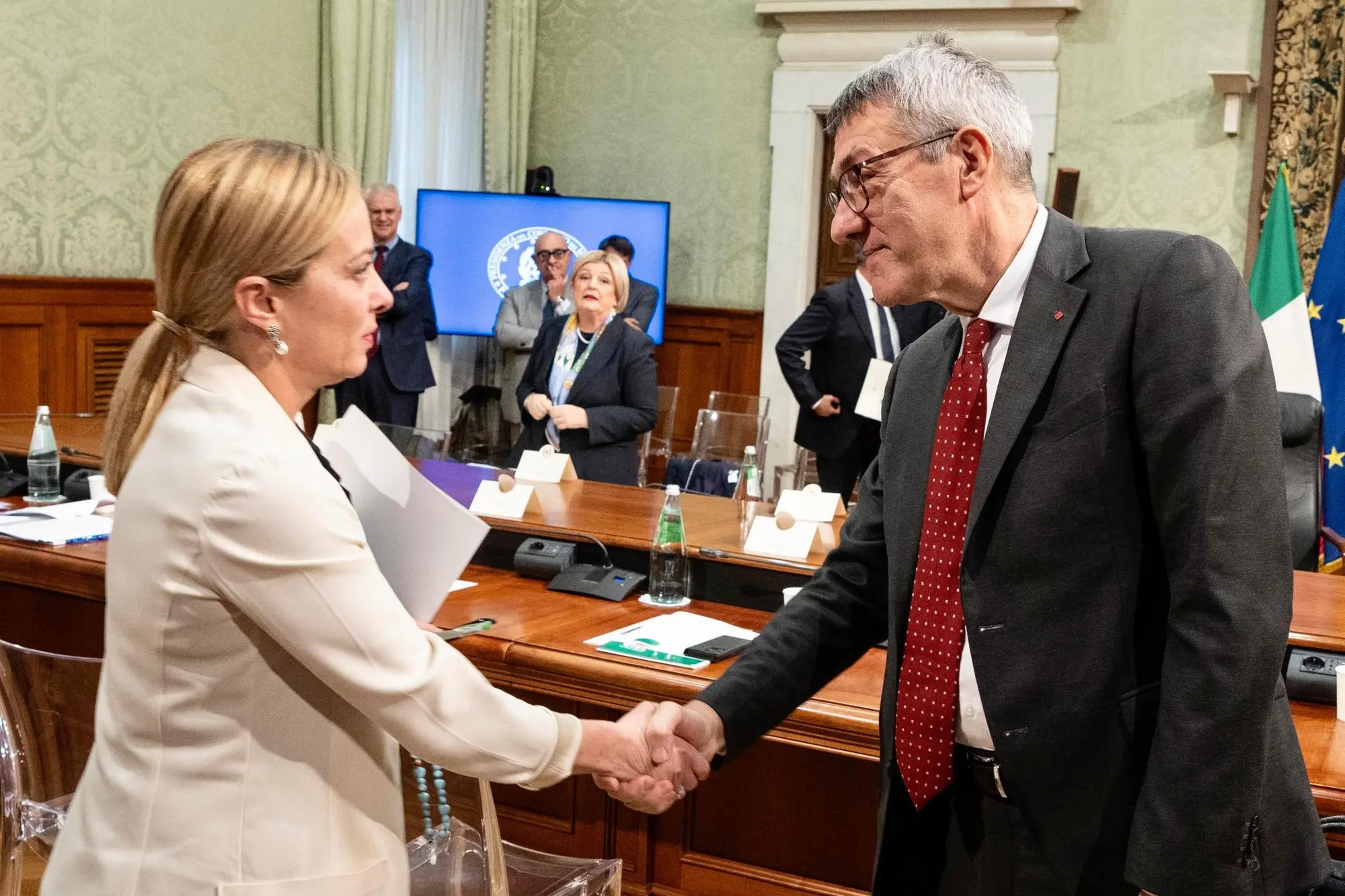 Giorgia Meloni con Maurizio Landini (Ansa)
