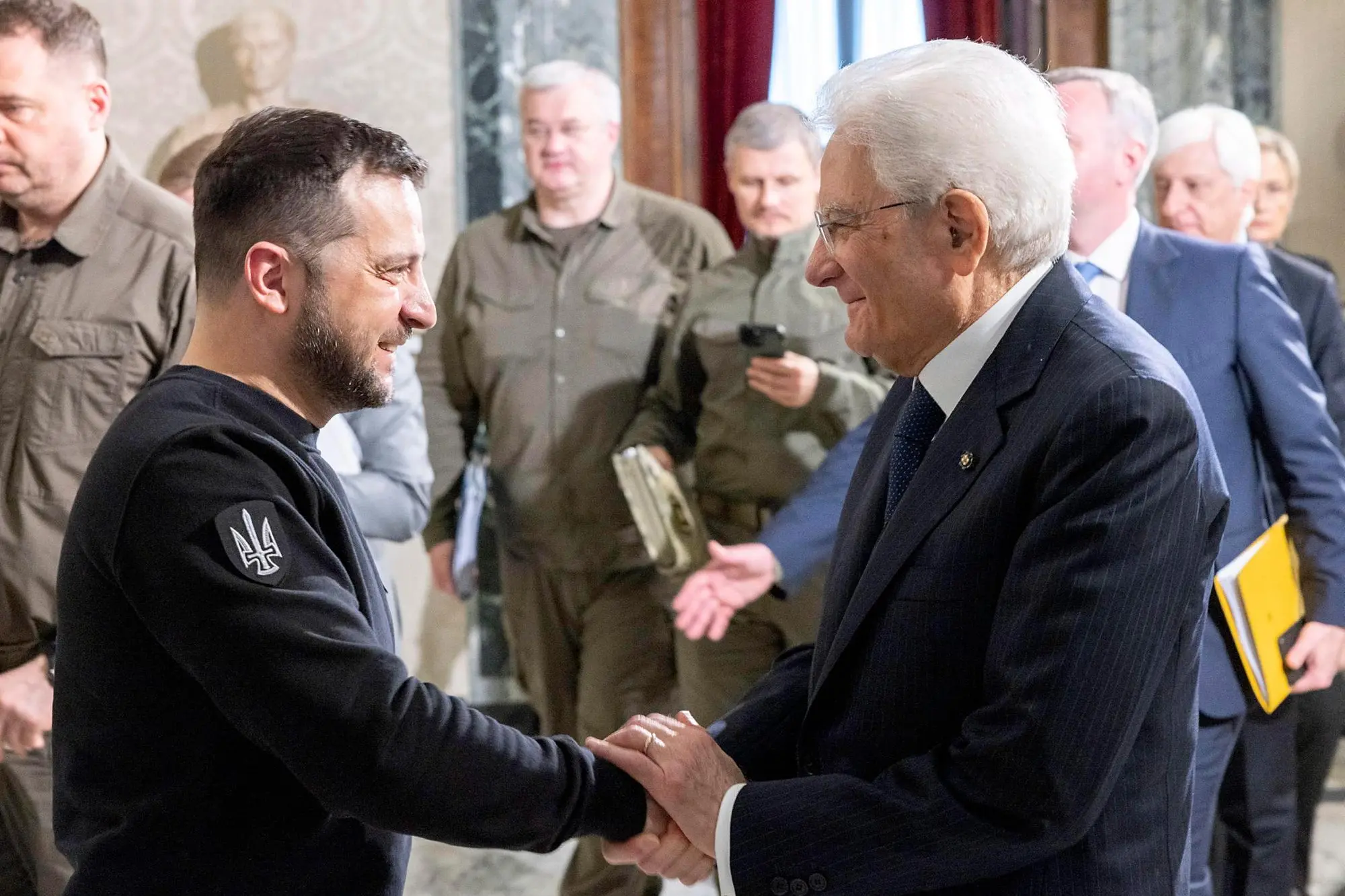 epa10624653 A handout picture made available by the Quirinal Presidential Palace (Palazzo del Quirinale) Press Office shows Ukrainian President Volodymyr Zelensky (L) shaking hands with Italian President Sergio Mattarella (R) upon arrival at Quirinale Palace for a meeting, Rome, Italy, 13 May 2023. It is the first time for Zelensky to come to Italy since the start of the Russian invasion of Ukraine in February 2022. EPA/QUIRINAL PALACE PRESS OFFICE HANDOUT HANDOUT EDITORIAL USE ONLY/NO SALES