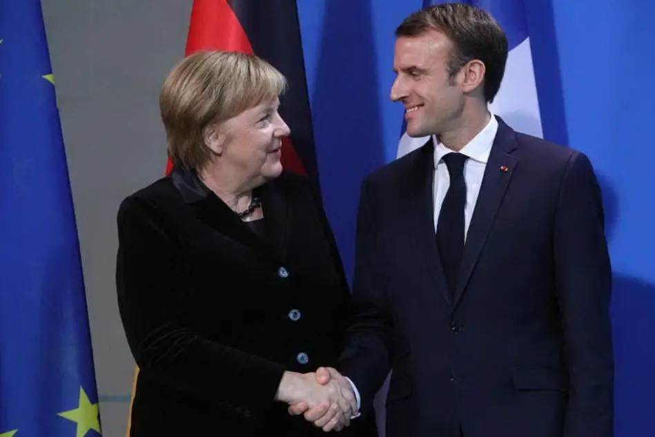 Angeka Merkel ed Emmanuel Macron (Ansa)