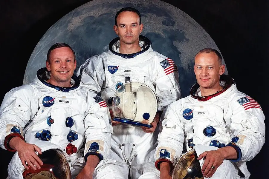 Collins, al centro, tra Armstrong (alla sua destra) e Aldrin ai tempi dell'Apollo 11 (Foto Nasa)