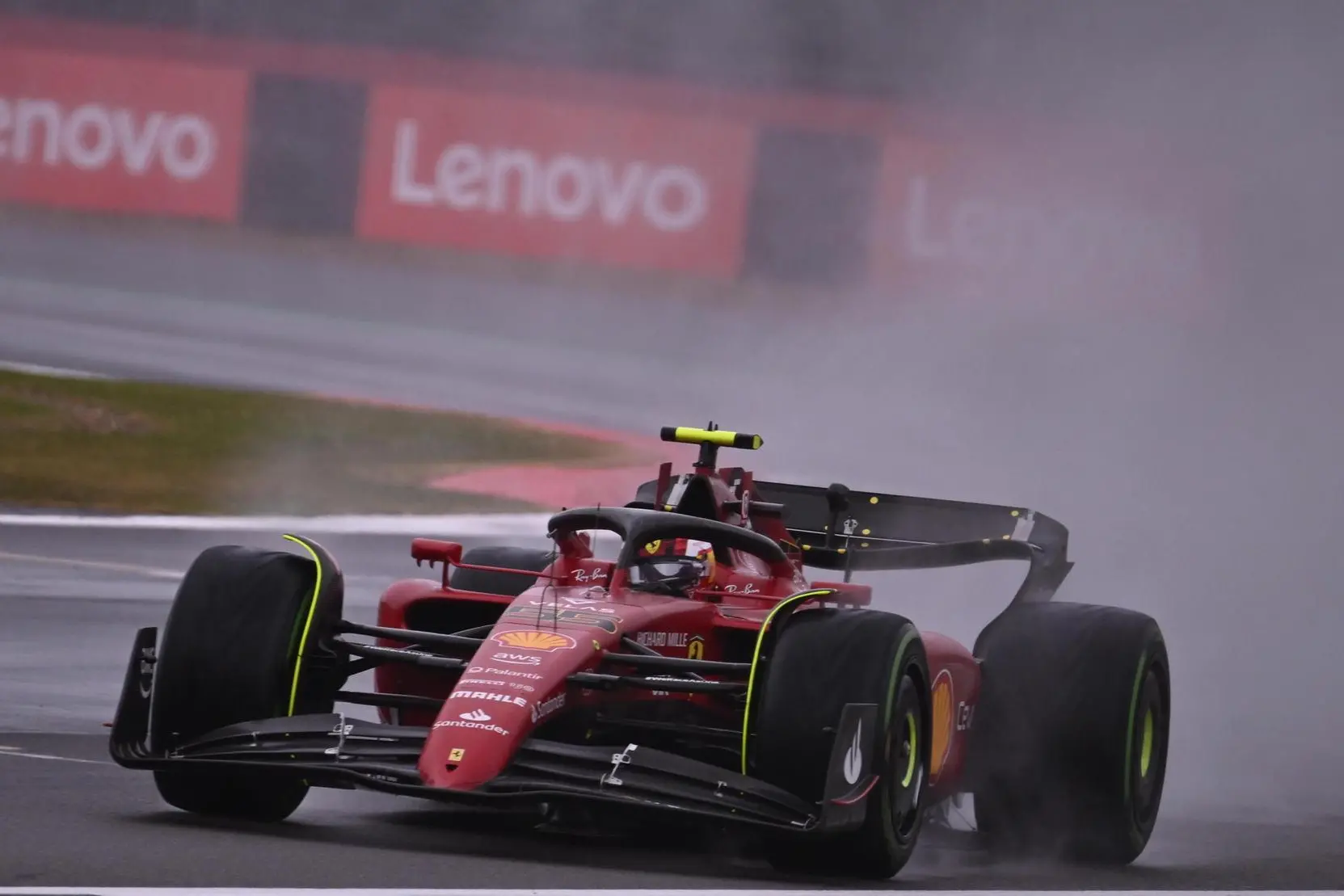 epa10047939 Spanish Formula One driver Carlos Sainz of Scuderia Ferrari in action during the qualifying session of the Formula One Grand Prix of Britain at the Silverstone Circuit, Silverstone, Britain, 02 July 2022. The British Formula One Grand Prix will take place on 03 July 2022. EPA/CHRISTIAN BRUNA