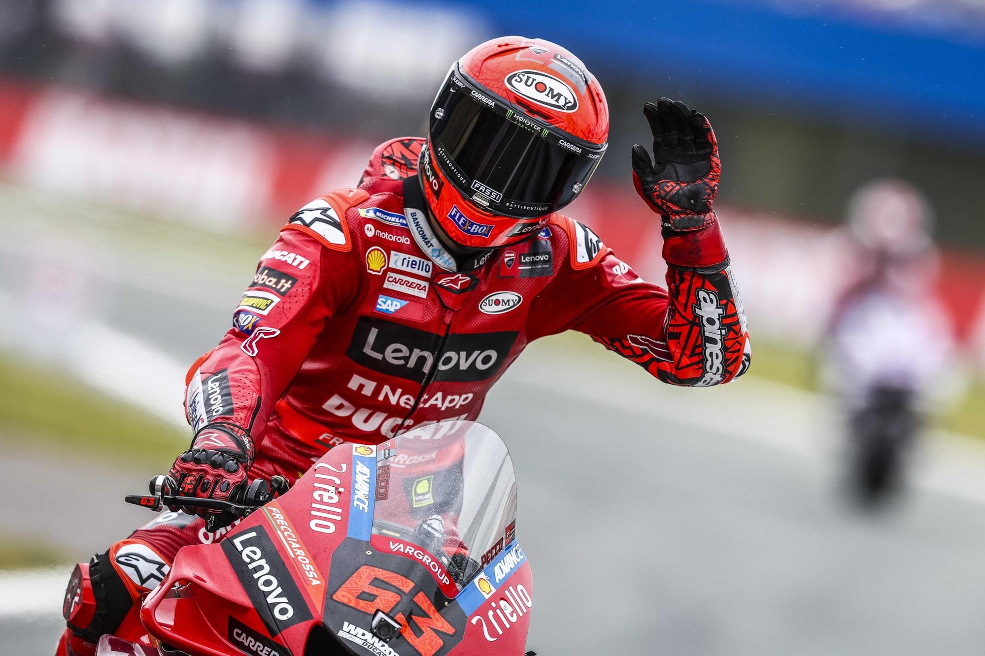 Francesco Bagnaia from Italy on his Ducati celebrates winning the MotoGP qualifying session for the Motorcycling Grand Prix of the Netherlands at the TT circuit of Assen, Netherlands, 25 June 2022. ANSA/Vincent Jannink
