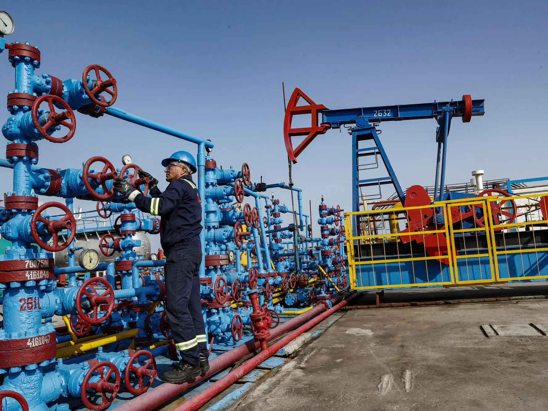 epa10856528 A man works at the Neft Daslari (Oil Rocks) oil rig and industrial settlement incorporating numerous drilling oil platforms at the Caspian Sea, about 100km from Baku, Azerbaijan, 06 September 2023. The name Azerbaijan comes from the Persian 'The Land of Fire', as it has rich oil and natural gas deposits. Most of the production is carried out by The State Oil Company of the Republic of Azerbaijan SOCAR at the Neft Daslari (Oil Rocks) Oil and Natural gas field. Neft Daslari, 55 km from the nearest shore, was the first operating offshore oil platform in the world, including numerous drilling platforms. It is featured in the Guinness Book of World Records as the world's first offshore oil platform. The construction of the settlement began during the Soviet era in 1949. Now the settlement has a system of paths and platforms over 300 km of streets and bridges connecting the artificial islands built on the back of ships sunk, garbage, and underwater rocks to serve as foundation. The population of the settlement is about 2,000 workers. EPA/MAXIM SHIPENKOV ATTENTION: This Image is part of a PHOTO SET