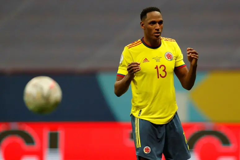 Mina con la maglia della nazionale (foto Ansa)