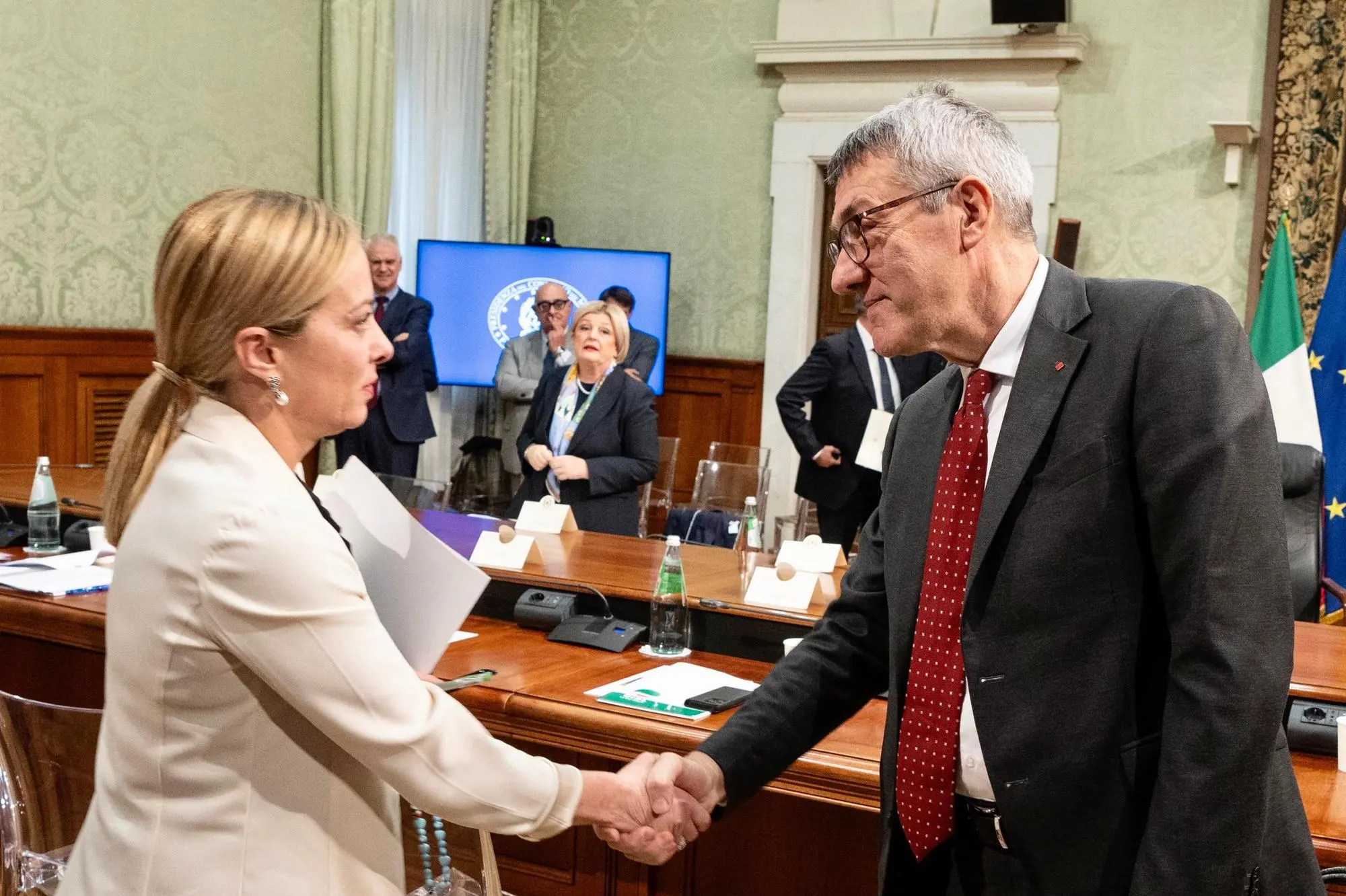 Giorgia Meloni con Maurizio Landini (Ansa)