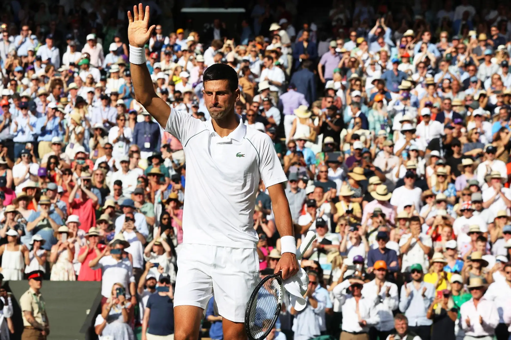 epa10059878 Novak Djokovic of Serbia celebrates after winning his men's semi final match against Cameron Norrie of Britain at the Wimbledon Championships in Wimbledon, Britain, 08 July 2022. EPA/KIERAN GALVIN EDITORIAL USE ONLY