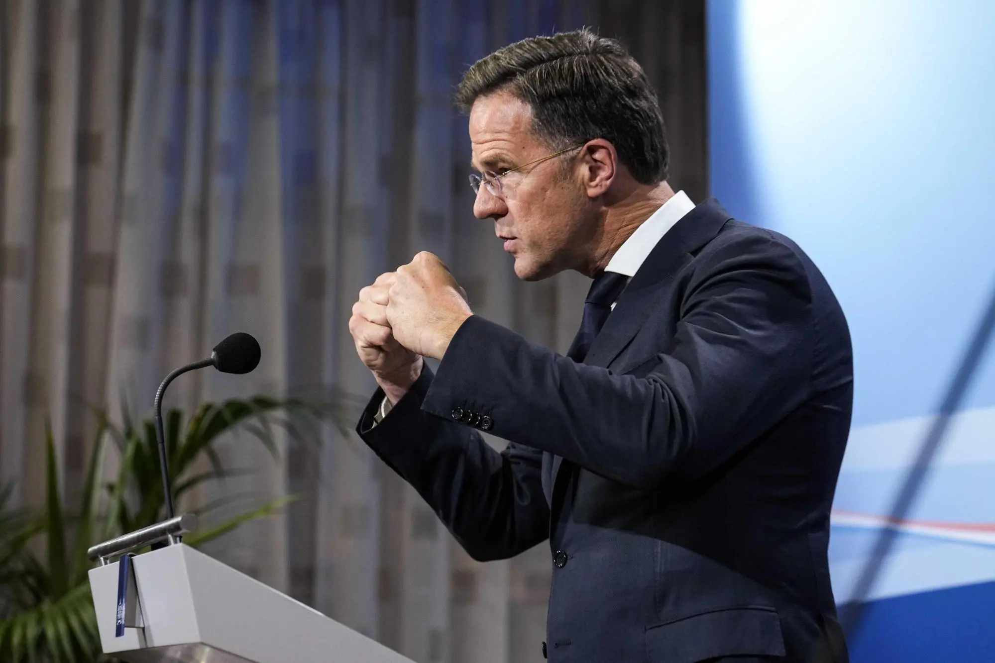 epa10733365 Outgoing Prime Minister Mark Rutte speaks to the press after an extra cabinet meeting in the Hague, Netherlands, 07 July 2023. Rutte announced his resignation citing irreconcilable differences within his four-party coalition about how to rein in migration. EPA/Robin Utrecht