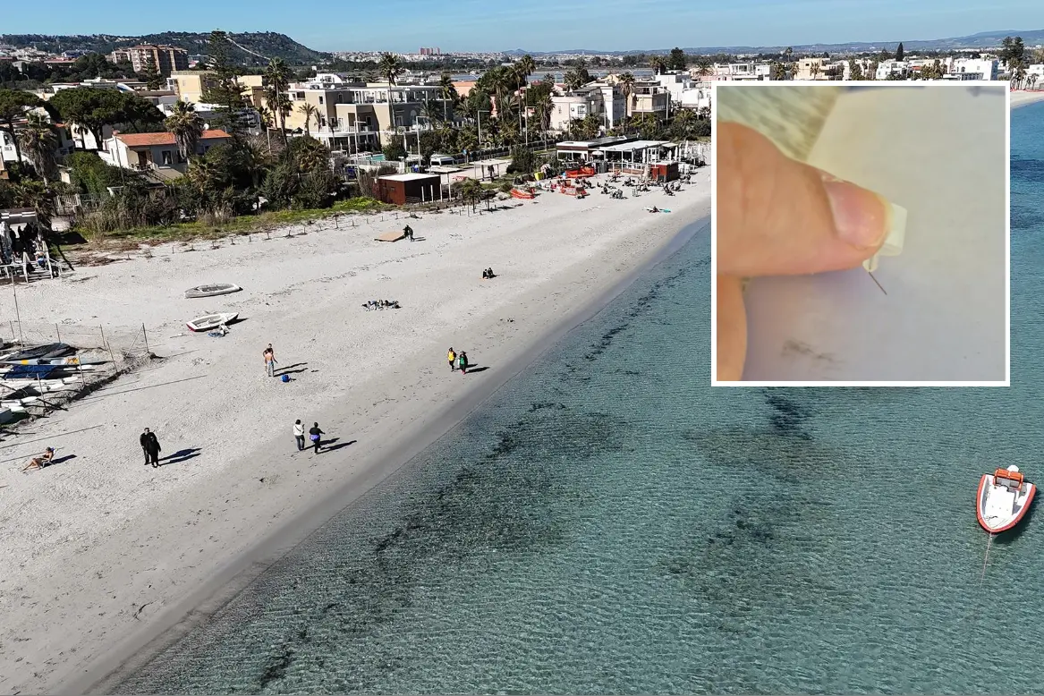Nello sfondo la spiaggia del Poetto. Nel riquadro l'ago trovato in spiaggia