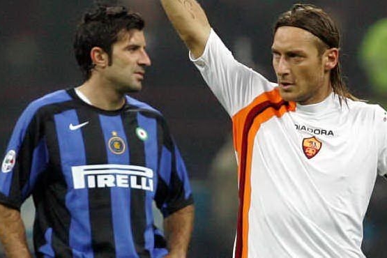 Luis Figo e Francesco Totti (Ansa)