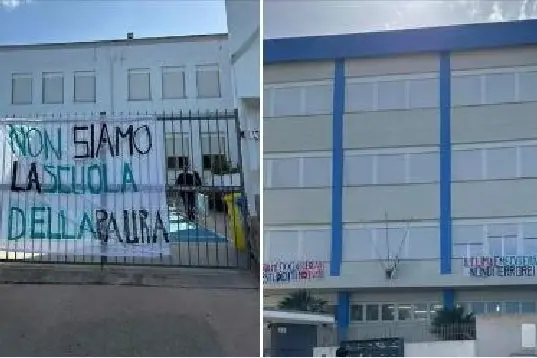 Gli striscioni sulla scuola (foto Pala)