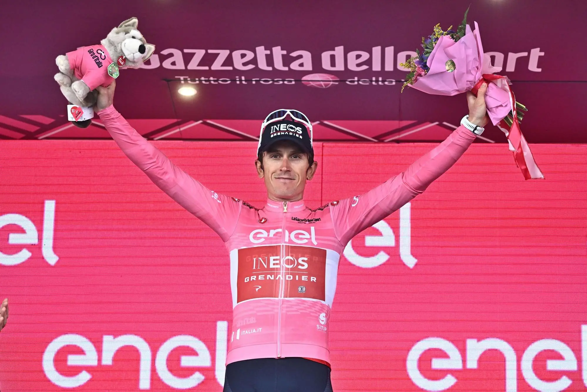 British rider Geraint Thomas of Ineos Grenadiers team wearing the overall leader's pink jersey celebrates on the podium the overall leader's pink jersey after the nineteenth stage of the 2023 Giro d'Italia cycling race over 183 km from Longarone to Tre Cime di Lavaredo, Italy, 26 May 2023. ANSA/LUCA