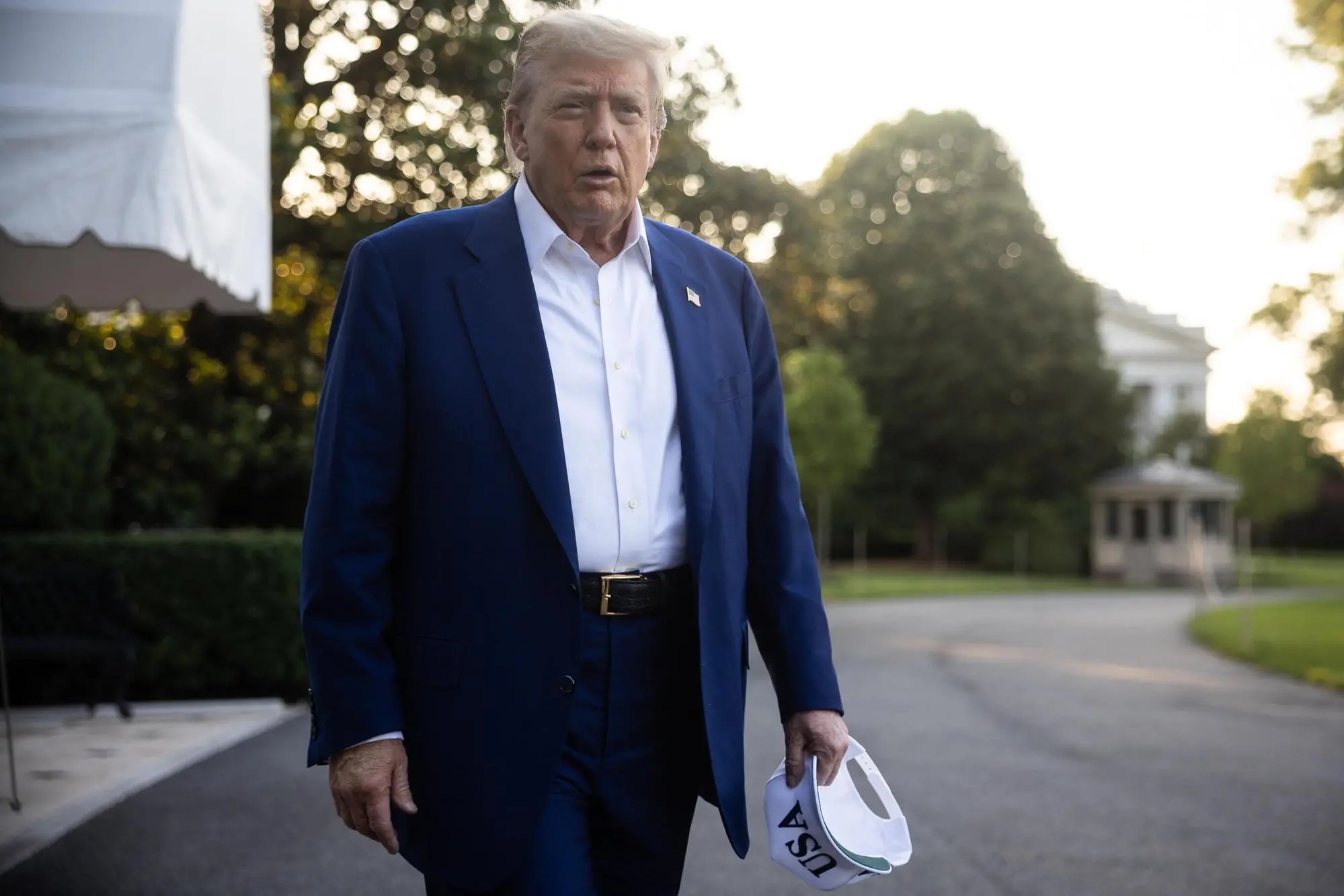 epa12194454 US President Donald Trump walks on the South Lawn of the White House before boarding the Marine One, in Washington, DC, USA, 24 June 2025. President Trump is expected to attend the NATO summit in The Hague, the Netherlands. EPA/FRANCIS CHUNG / POOL