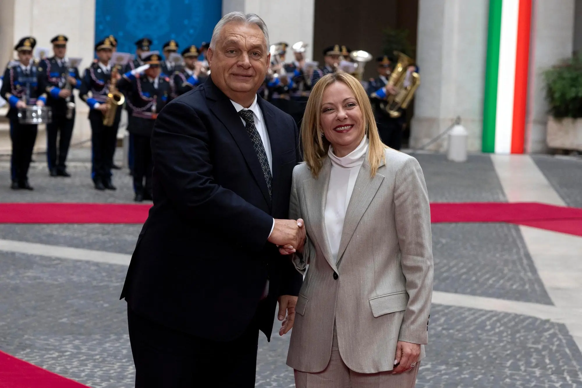 Italian Prime Minister Giorgia Meloni (R) welcomes Hungarian Prime Minister Viktor Orban (L) at the Chigi palace in Rome, Italy, 27 October 2025. ANSA/MASSIMO PERCOSSI