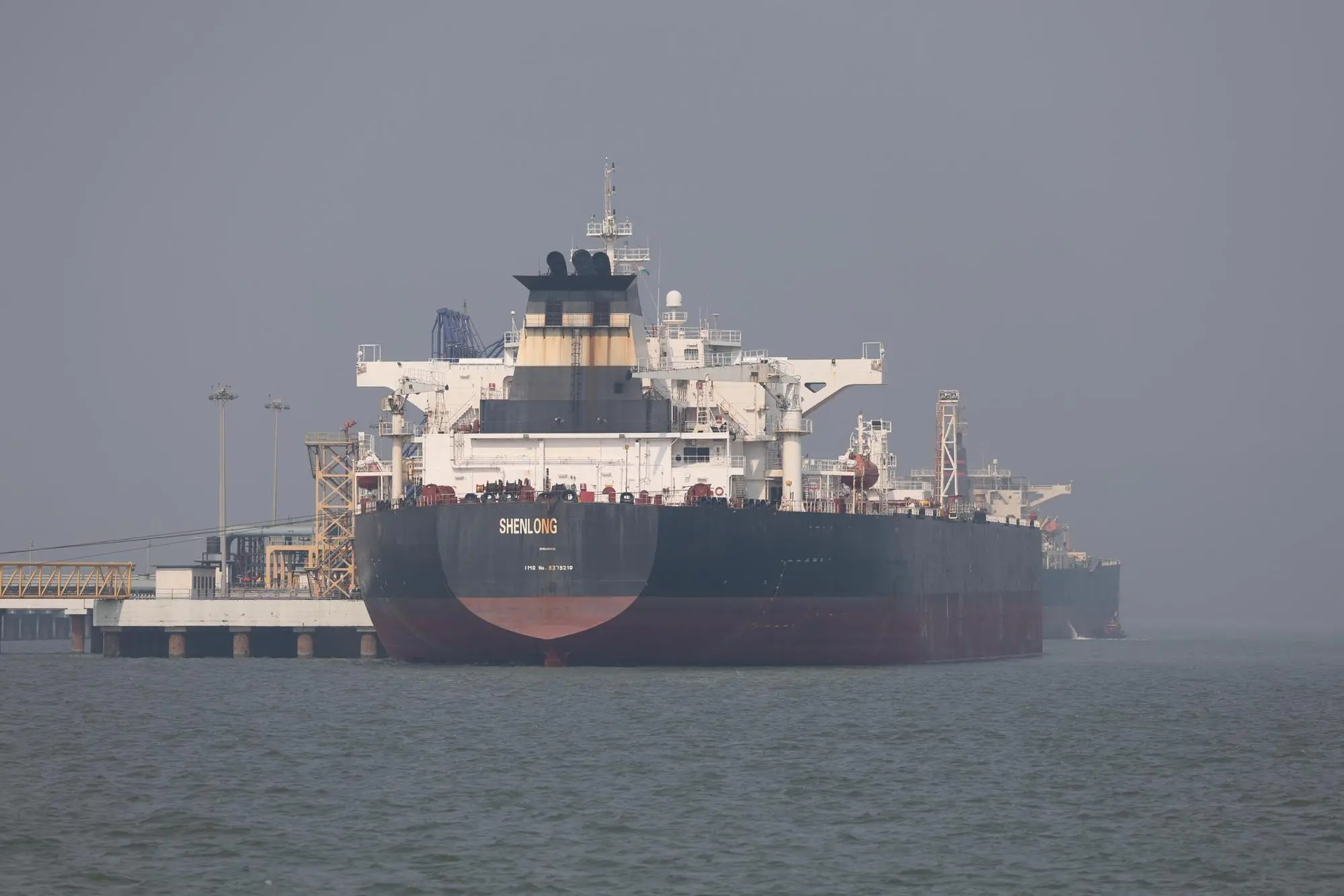 epa12813810 The Liberia-flagged tanker Shenlong, carrying crude oil from Saudi Arabia to India via the Strait of Hormuz, arrives at Mumbai Port in Mumbai, India, 12 March 2026. Iran has allowed Indian oil tankers to pass through the Strait of Hormuz following diplomatic talks between External Affairs Minister S. Jaishankar and his Iranian counterpart Abbas Araghchi. EPA/DIVYAKANT SOLANKI