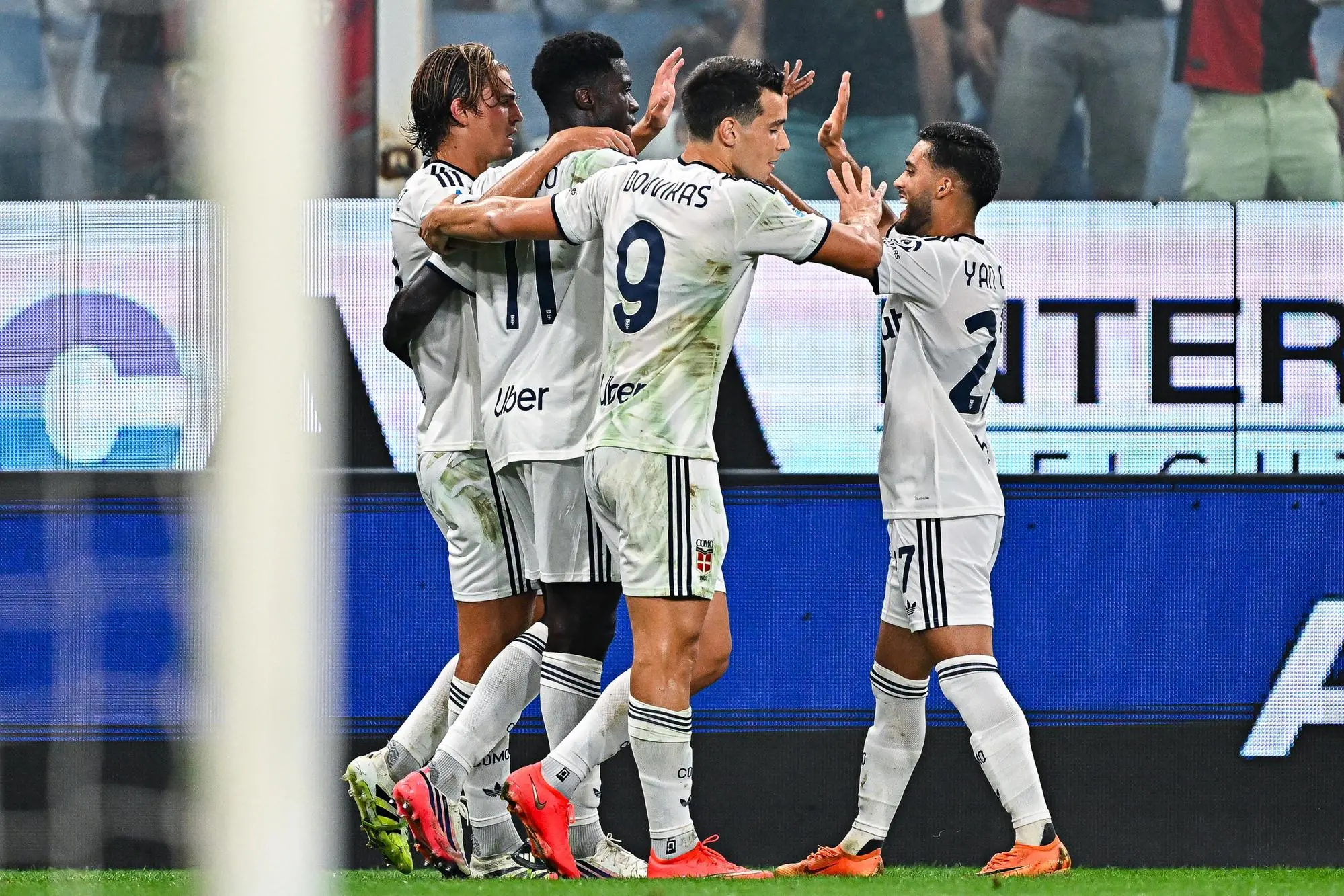 Como's Argentinian midfielder Nicolas Paz (left) celebrates with his team-mates after scoring a goal during the Italian Serie A soccer match Genoa Cfc vs Como 1907 at Luigi Ferraris stadium in Genoa, Italy, 4 September 2026. ANSA/STRINGER