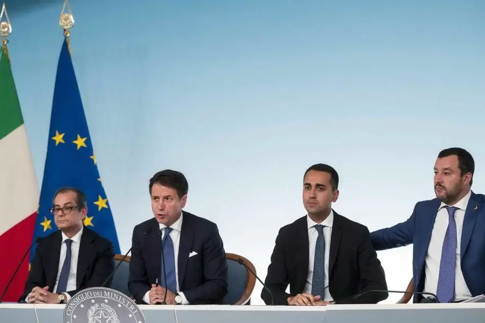 Da sinistra: Giovanni Tria, Giuseppe Conte, Luigi Di Maio e Matteo Salvini (Ansa)