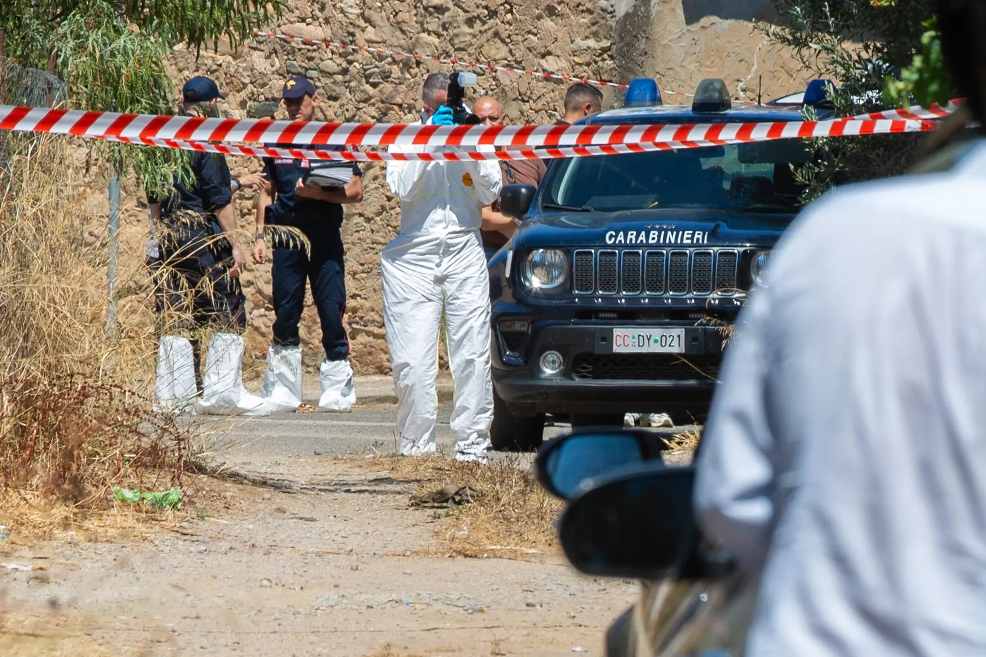 Gli investigatori sul luogo del delitto