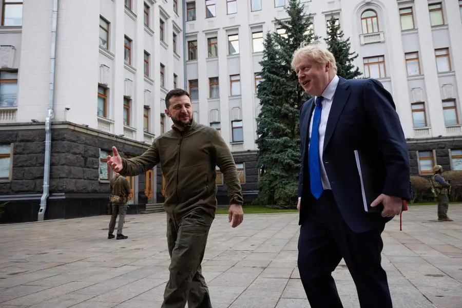 epa09880735 A handout photo made available by Ukrainian Presidential Press Service shows British Prime Minister Boris Johnson (R) and Ukrainian President Volodymyr Zelensky (L) walk ahead their meeting in Kyiv, Ukraine, 09 April 2022. British Prime Minister Boris Johnson paid an unannounced visit to Kyiv on April 9 to 'show solidarity' with Ukraine a day after a missile strike killed dozens at a railway station in the country's east. EPA/UKRAINIAN PRESIDENTIAL PRESS SERVICE / HANDOUT HANDOUT EDITORIAL USE ONLY/NO SALES