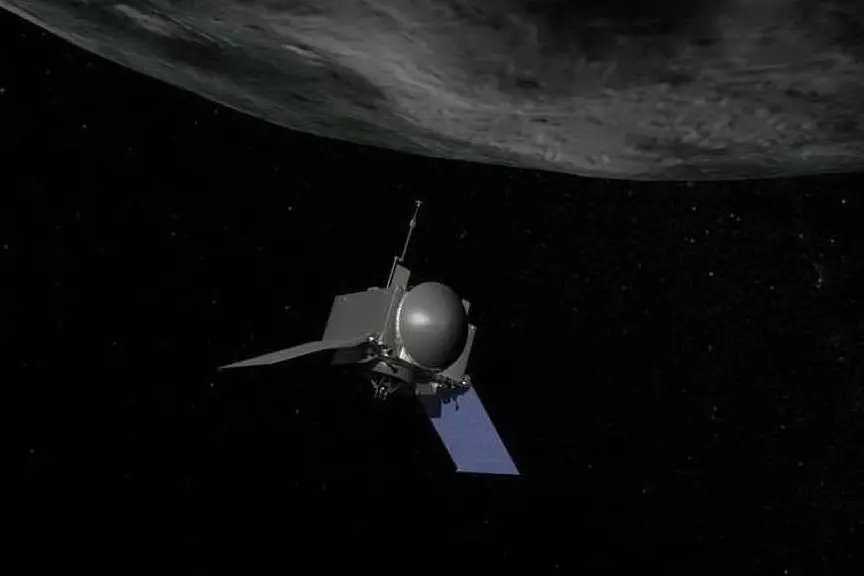 Elaborazione artistica dell'avvicinamento della sonda all'asteroide Bennu (Ansa)