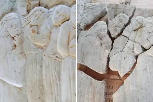 La tavola vandalizzata e restaurata (foto Pala)