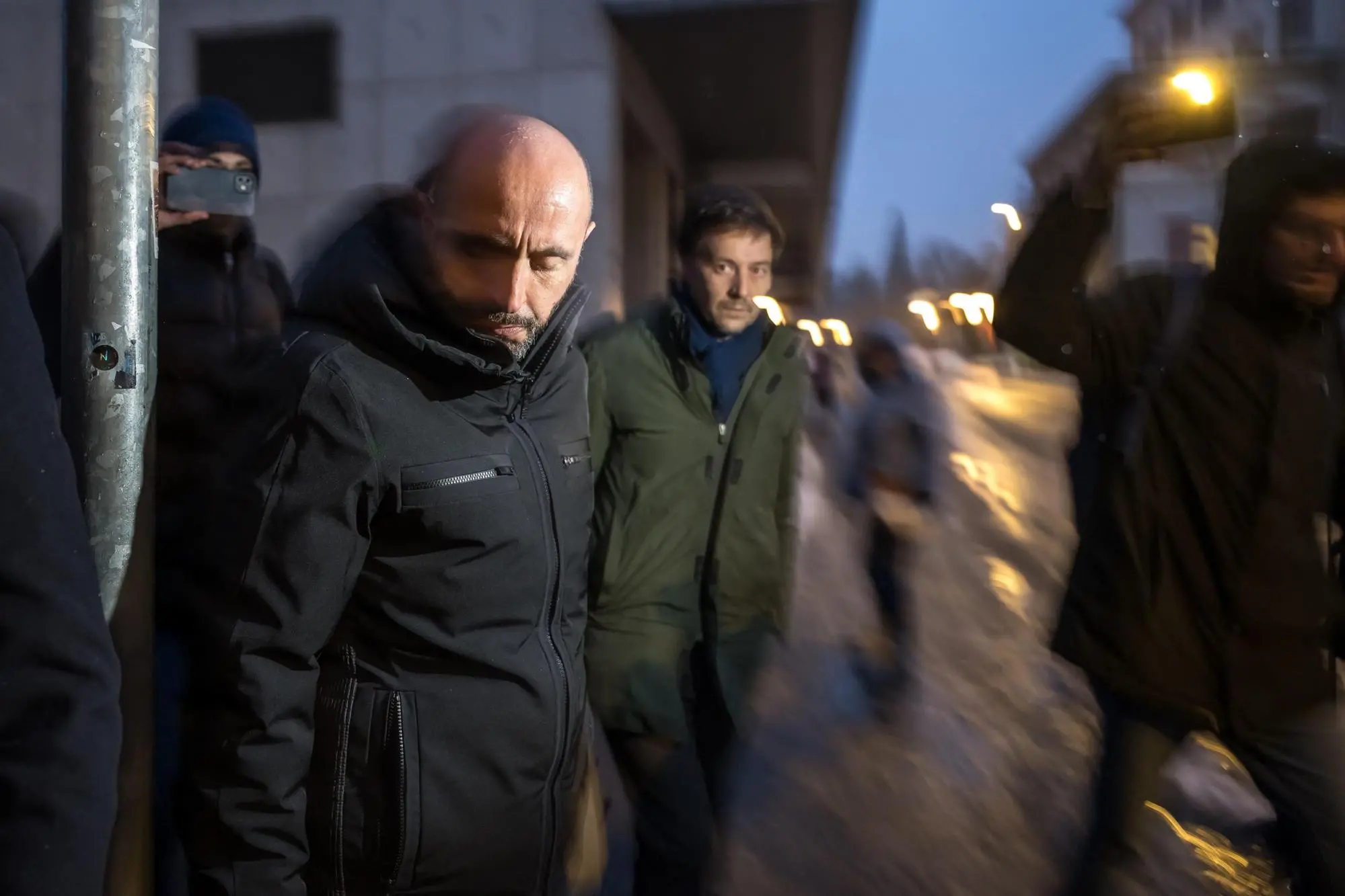 Owner of "Le Constellation" bar Jacques Moretti (L) arrives for a hearing at the Office of the public prosecutor of the Canton of Valais in Sion on January 9, 2026. The French couple, facing charges of manslaughter by negligence, bodily harm by negligence and arson by negligence, have been called in for questioning after 40 people, most of them teenagers, were killed, while 116 were injured in a fire that ripped through a bar in the luxury Alpine ski resort of Crans-Montana on New Year's Eve. (Photo by Fabrice COFFRINI / AFP)