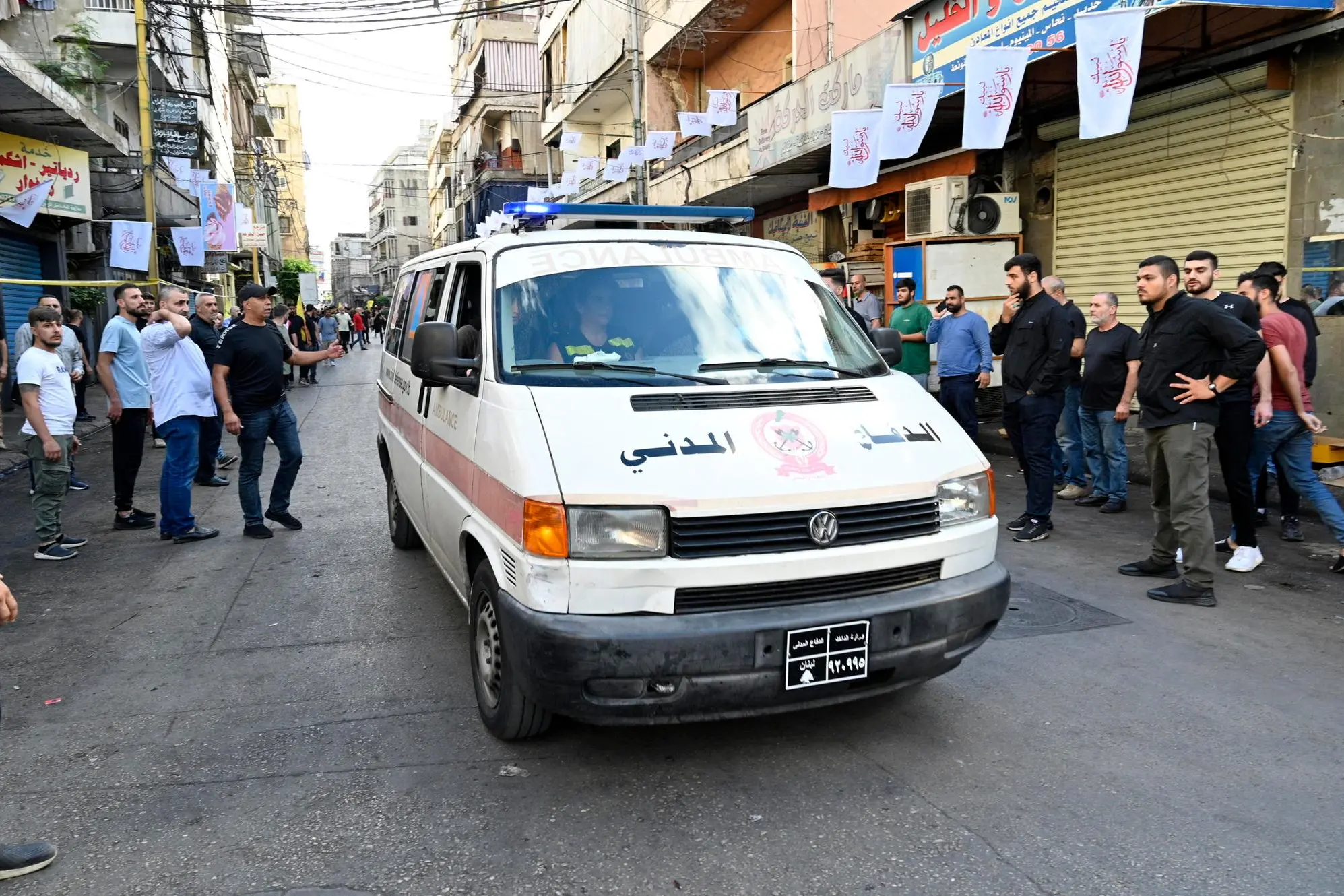 epaselect epa11611874 An ambulance drives in the southern suburb of Beirut after new blasts were reported, one day after exploding pagers killed 12, in Beirut, Lebanon, 18 September 2024. According to Lebanon’s state news agency, a number of wounded people were transferred to hospitals in the Beirut's southern suburbs following the explosion of wireless pagers on 18 September. Health Minister of Lebanon Firas Abiad said at least 12 people died and more than 2800 others injured after multiple wireless communication devices (pagers) were detonated on 17 September. Hezbollah declared in a statement that Israel was behind the strike and that there will be consequences. EPA/WAEL HAMZEH