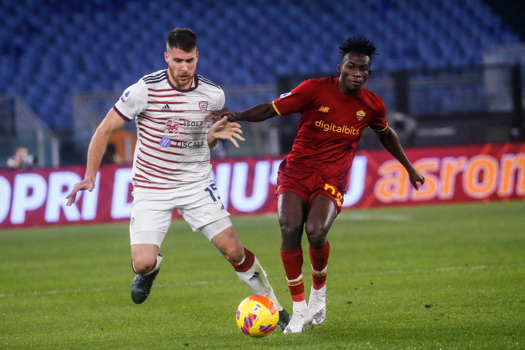 Cagliari's Giorgio Altare and Roma’s Felix Afena-Gyan, during the Italian Serie A soccer match between Roma and Cagliari at the Olimpico stadium in Rome 16 January 2022. ANSA/FABIO FRUSTACI