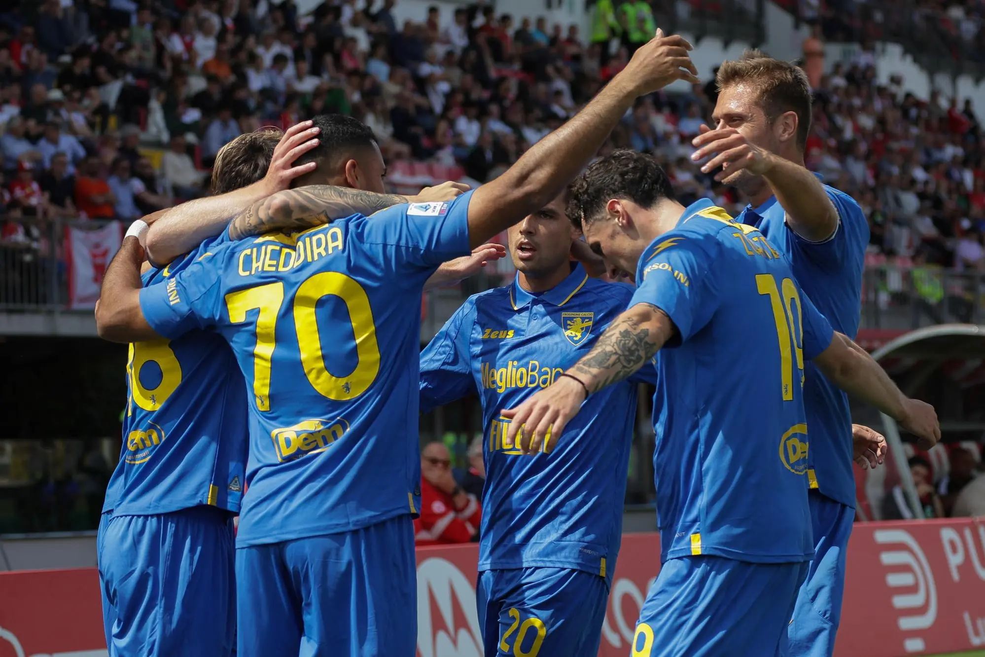 Frosinone's players celebrate the goal scored by Frosinone's forward Walid Cheddira during the Italian Serie A soccer match between AC Monza and Frosinone at U-Power Stadium in Monza, Italy, 19 May 2024. ANSA / ROBERTO BREGANI