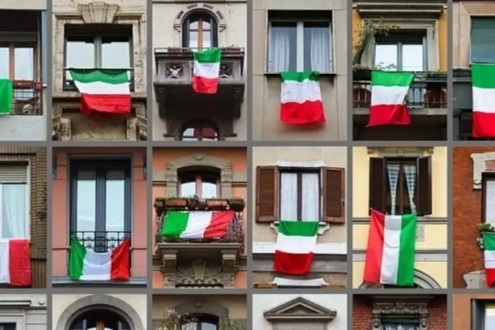 Tricolori esposti ai balconi (foto Ansa)