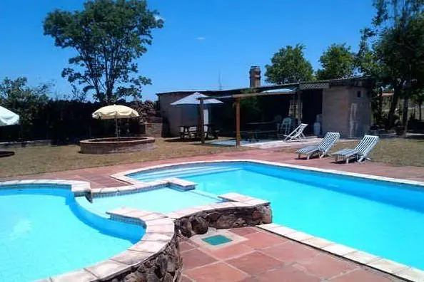 Una villa con piscina (immagine simbolo)