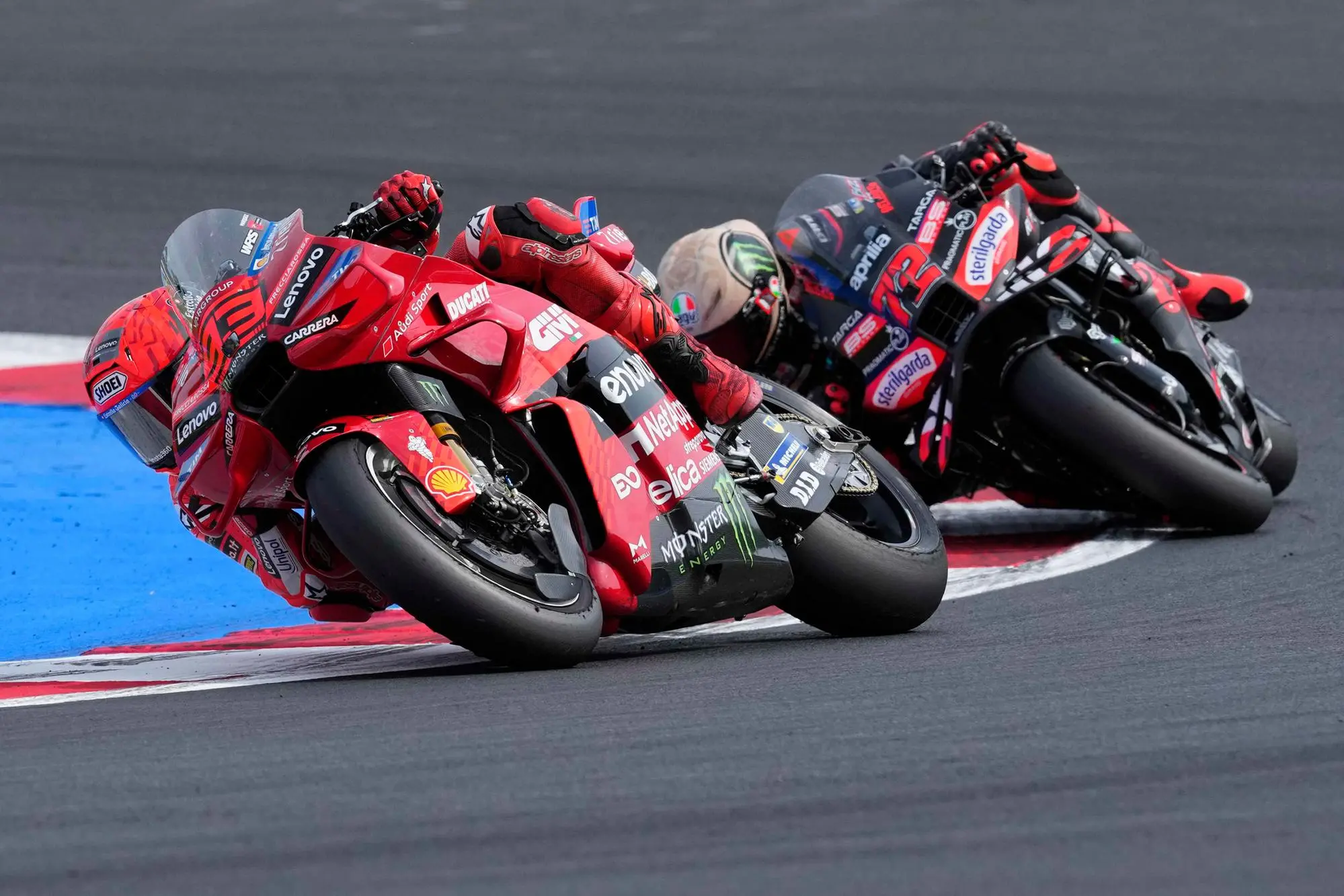 Ducati Lenovo Team rider Marc Marquez of Spain (R) steers his motorcycle the Red Bull Grand Prix of San Marino and the Rimini Riviera at the Misano World Circuit Marco Simoncelli in Misano Adriatico, Italy, 14 September 2025. ANSA/DANILO DI GIOVANNI