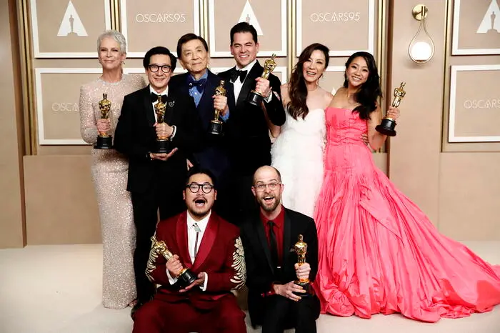 epa10519409 (L-R top row) Jamie Lee Curtis, winner of the Best Supporting Actress award, Ke Huy Quan, winner of the Best Actor In A Supporting Role award, James Hong, Jonathan Wang, winner of the Best Picture award, Michelle Yeoh, winner of the Best Actress in a Leading Role award, Stephanie Hsu and (L-R bottom row) Dan Kwan and Daniel Scheinert, winners of the Best Director and Best Picture award for 'Everything Everywhere All at Once,' pose in the press room during the 95th annual Academy Awards ceremony at the Dolby Theatre in Hollywood, Los Angeles, California, USA, 12 March 2023. The Oscars are presented for outstanding individual or collective efforts in filmmaking in 24 categories. EPA/CAROLINE BREHMAN