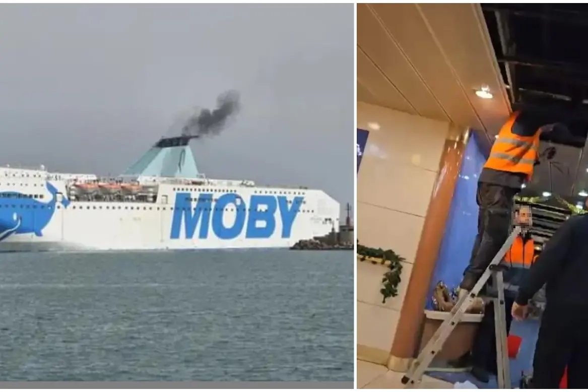 A destra operai al lavoro sulla Moby Ale 2 (frame da video)