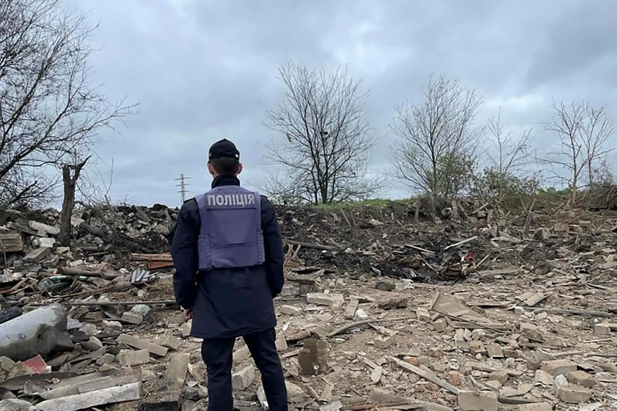 epa10602252 A handout photo made available by the National Police of Ukraine via telegram shows a police officer standing among debris at a site hit by shelling in Pavlohrad, Ukraine, 01 May 2023, amid Russia's invasion. At least 34 persons were injured, including five children, after a military strike hit a residential area in Pavlohrad, the head of the Dnipropetrovsk Regional Military Administration, Serhiy Lysak wrote on telegram. Russian troops entered Ukrainian territory on 24 February 2022, starting a conflict that has provoked destruction and a humanitarian crisis. One year on, fighting continues in many parts of the country. EPA/NATIONAL POLICE OF UKRAINE / HANDOUT -- BEST QUALITY AVAILABLE -- MANDATORY CREDIT HANDOUT EDITORIAL USE ONLY/NO SALES