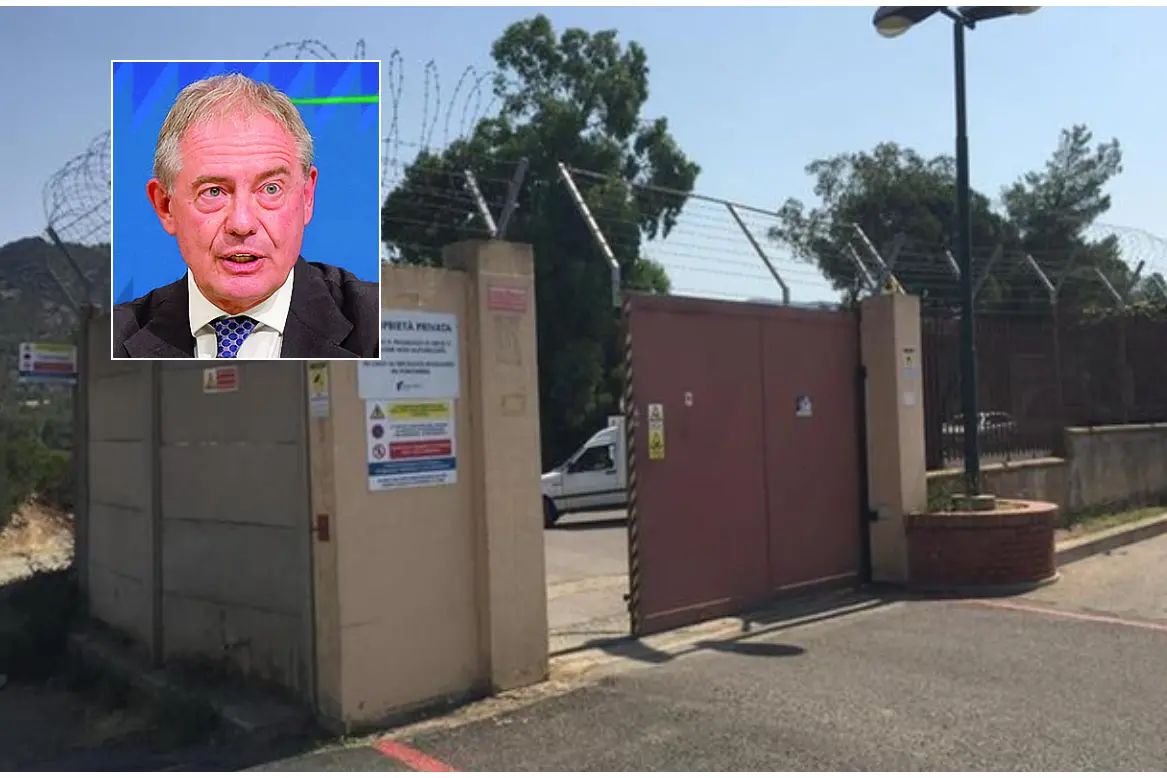 The entrance to the factory, with Minister Urso in the frame.