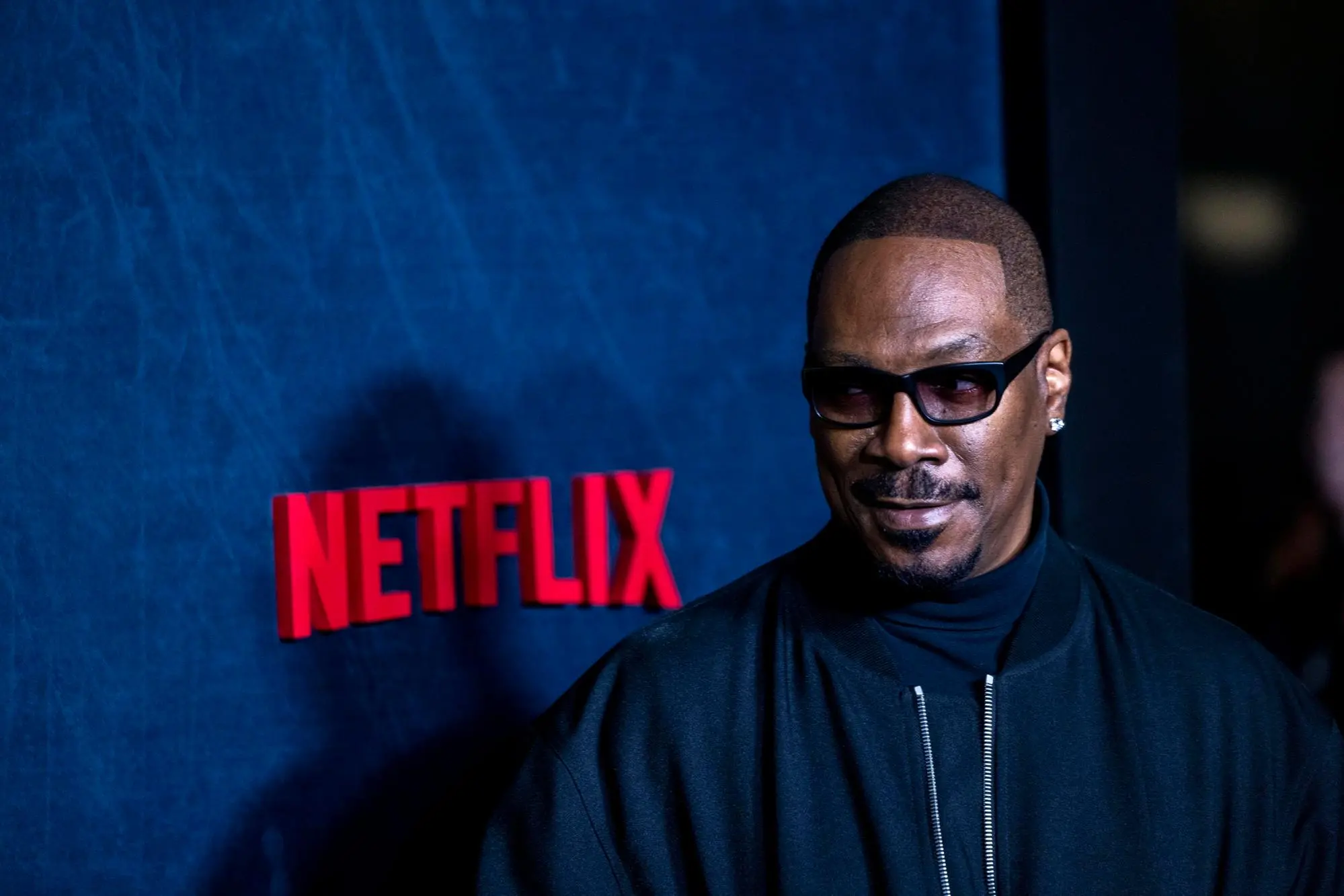 epa12522242 Eddie Murphy attends the premiere of the film, 'Being Eddie', at the Tudum Theater in Los Angeles, California, USA, 12 November 2025. The documentary film 'Being Eddie' gathers comedians and Hollywood legends to celebrate the Oscar-nominated actor Eddie Murphy and his decades-long career. EPA/JILL CONNELLY