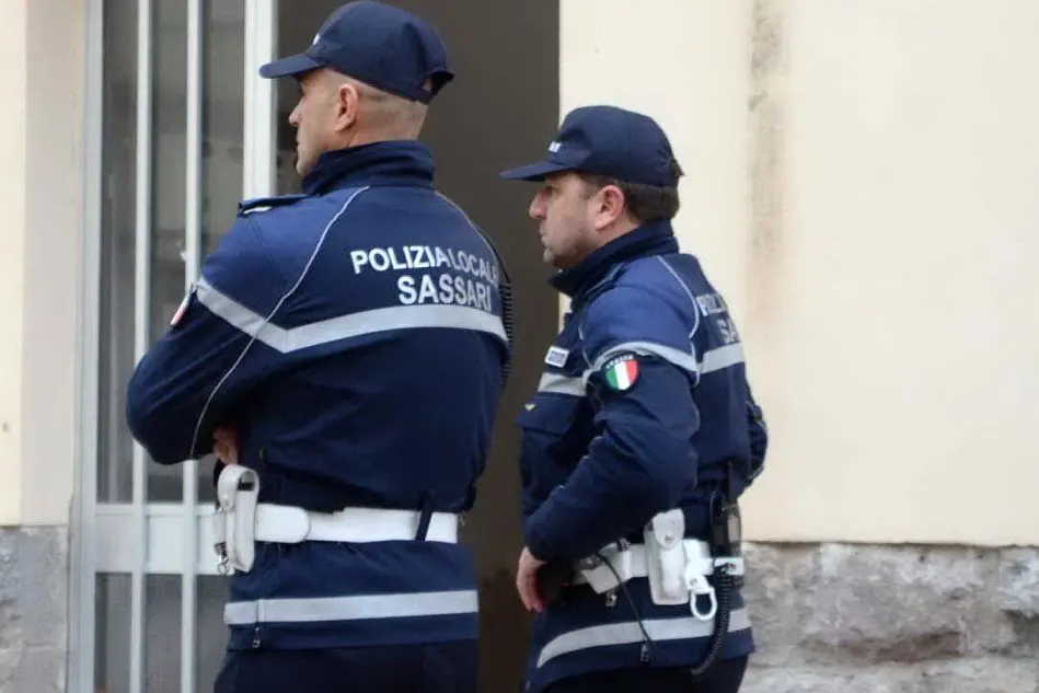 Due agenti (Archivio L'Unione Sarda - Calvi)