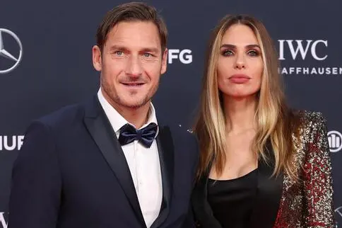 epa06569288 Former Italian soccer player Francesco Totti (L) and his wife Ilary Blasi (R) arrive at the 2018 Laureus World Sports Awards in Monaco, 27 February 2018. The annual Laureus Awards are held to honor people whom make a notable impact and remarkable accomplishments in the world of sport throughout the year. EPA/SEBASTIEN NOGIER