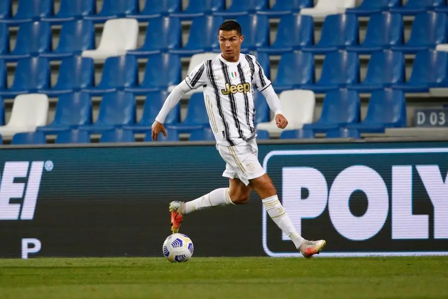 Juventus' Cristiano Ronaldo in action during the Italian Serie A soccer match US Sassuolo vs Juventus FC at Mapei Stadium in Reggio Emilia, Italy, 12 May 2021. ANSA / ELISABETTA BARACCHI