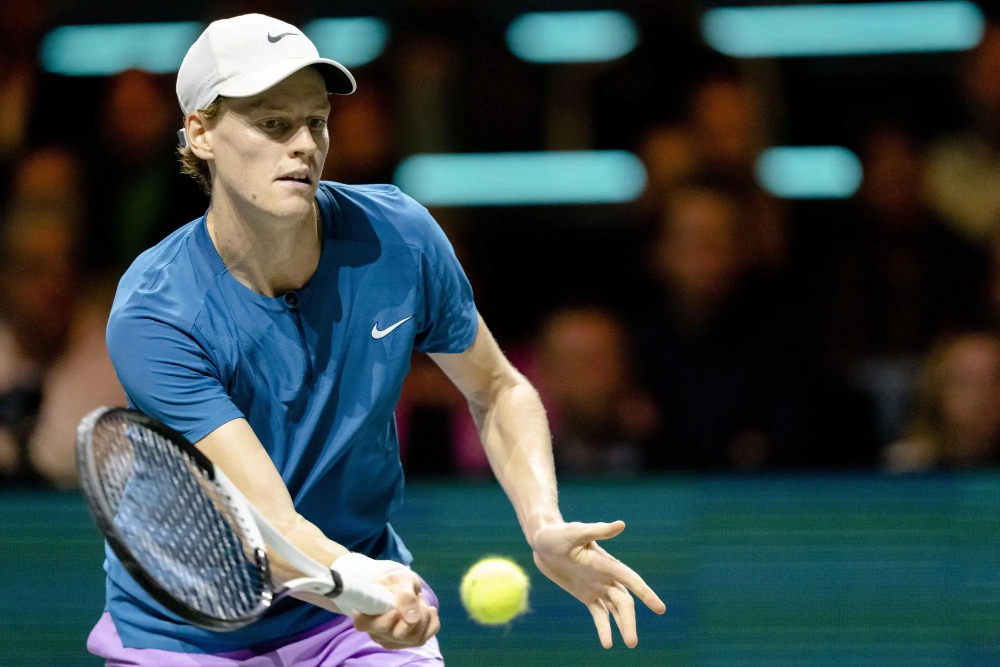 epa10473574 Jannik Sinner of Italy in action against Stanislas Wawrinka of Switzerland during their quarter final match at the ABN AMRO Open tennis tournament in Rotterdam, The Netherlands, 17 February 2023. EPA/Sander Koning