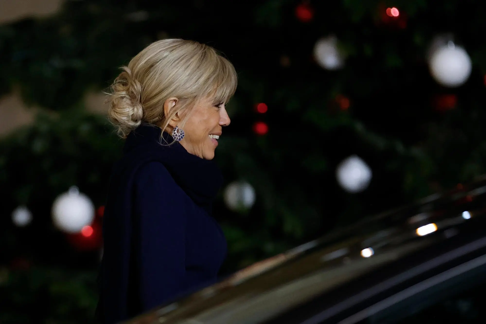 epa12579400 Brigitte Macron stands prior welcoming Croatian Prime Minister Andrej Plenkovic and his wife Ana Maslac Plenkovic (not pictured) at the Elysee Palace in Paris, France, 08 December 2025. EPA/YOAN VALAT
